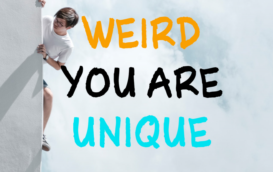 a person appears behind a wall and text reads 'You are not weird, you are unique'
